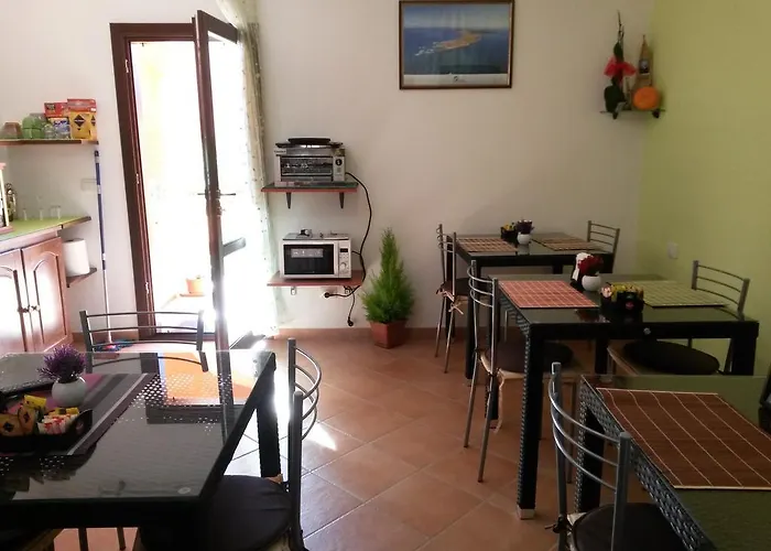 Гостевой дом Le Statue Del Sinis Кабрас